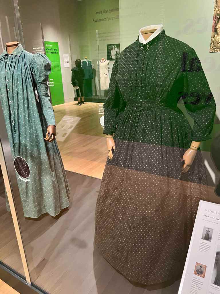 Black and white calico work dress from 1865 in The New York Historical What Women Wore exhibit